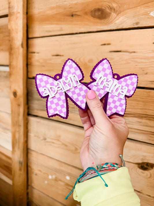 MYSTERY BOW BAG TAG