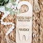 WOODEN TOOTH FAIR HANGER