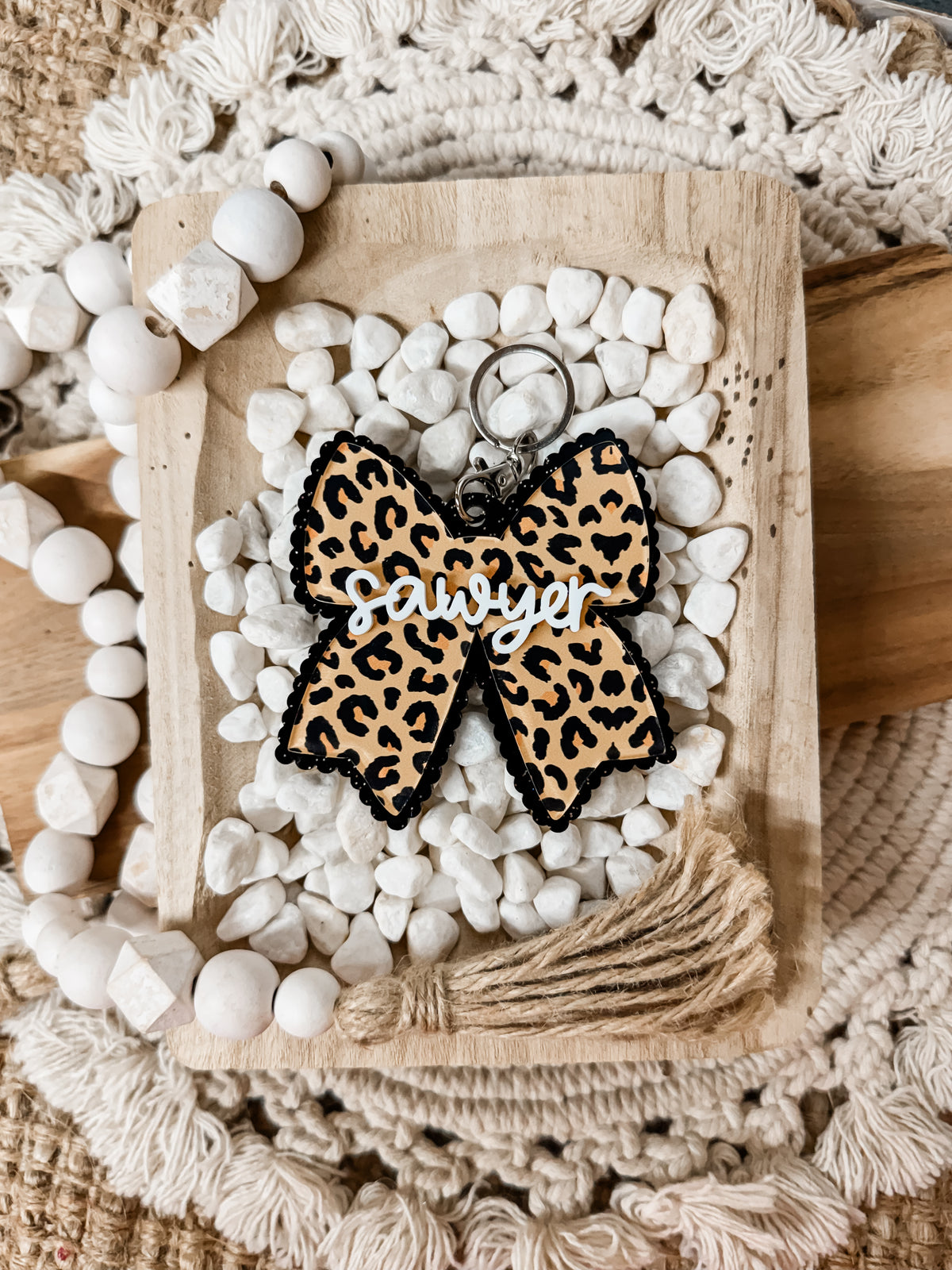 CHEETAH BOW BAG TAG