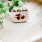 Brown and white cow studs