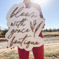 White Backer With Stained Letter Business Sign